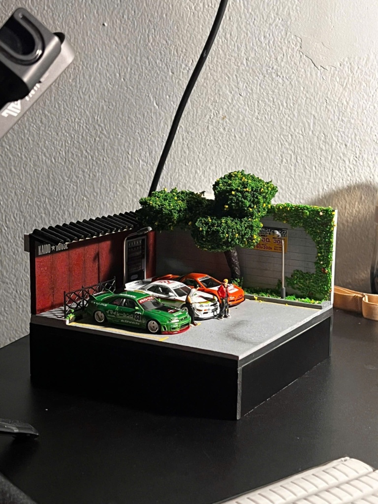 sa-ban-diorama-1-64-bai-do-xe-nhat-ban Sa bàn diorama 1:64 bãi đỗ xe Nhật Bản trưng bày 3 xe mô hình